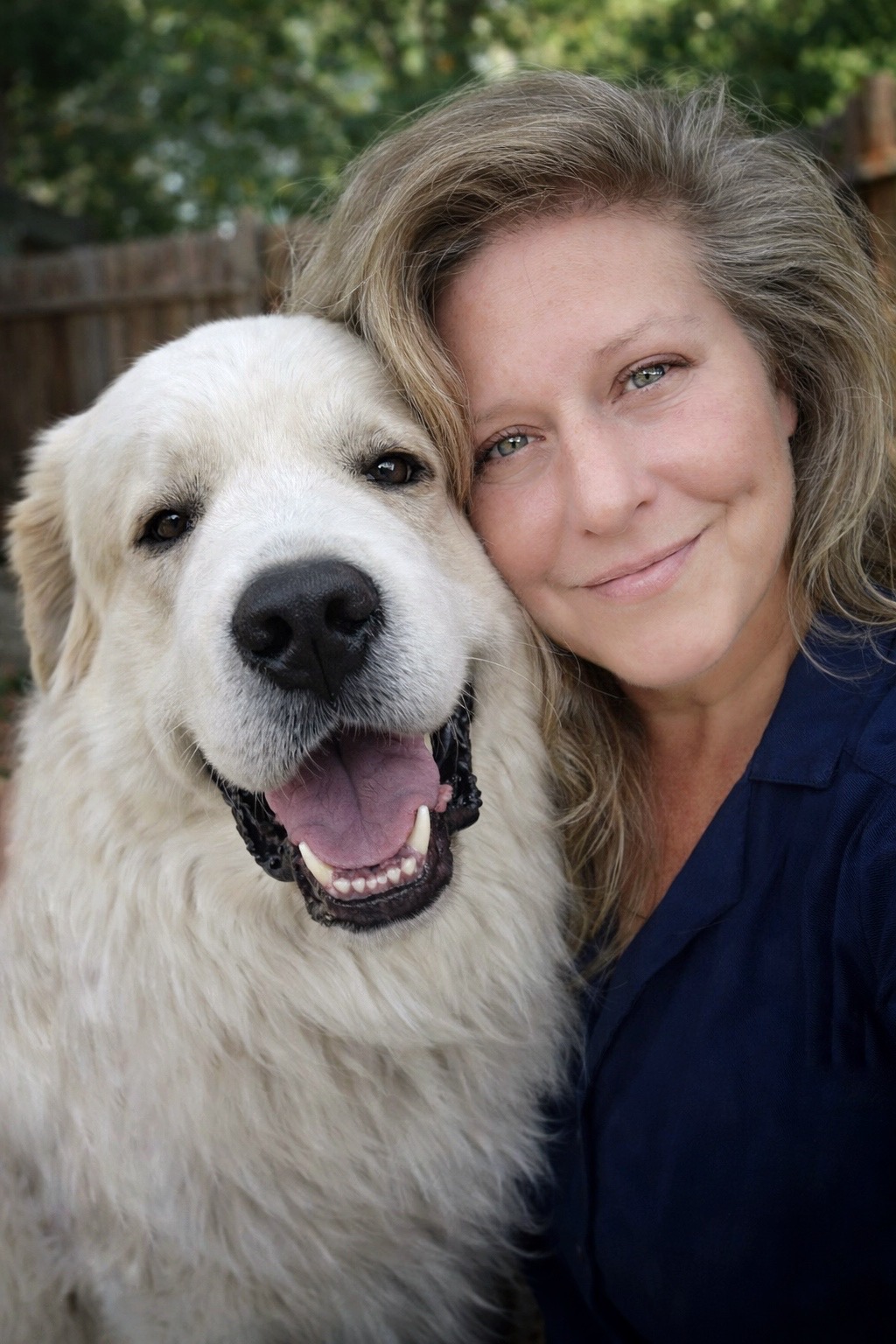 Founder of pet business SEO and web design agency with her Great Pyrenees